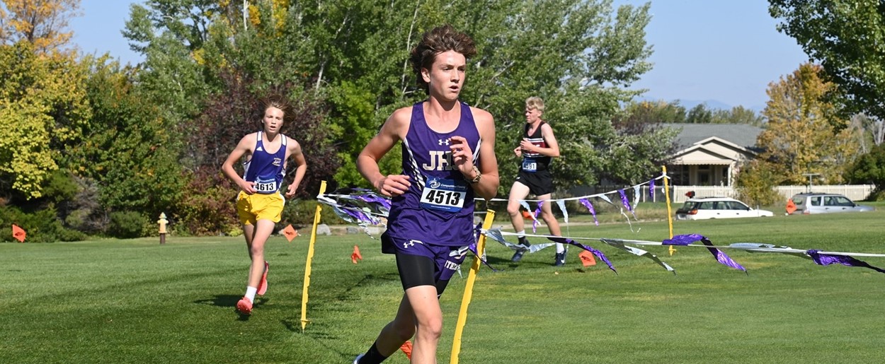 JHS cross country athletes running
