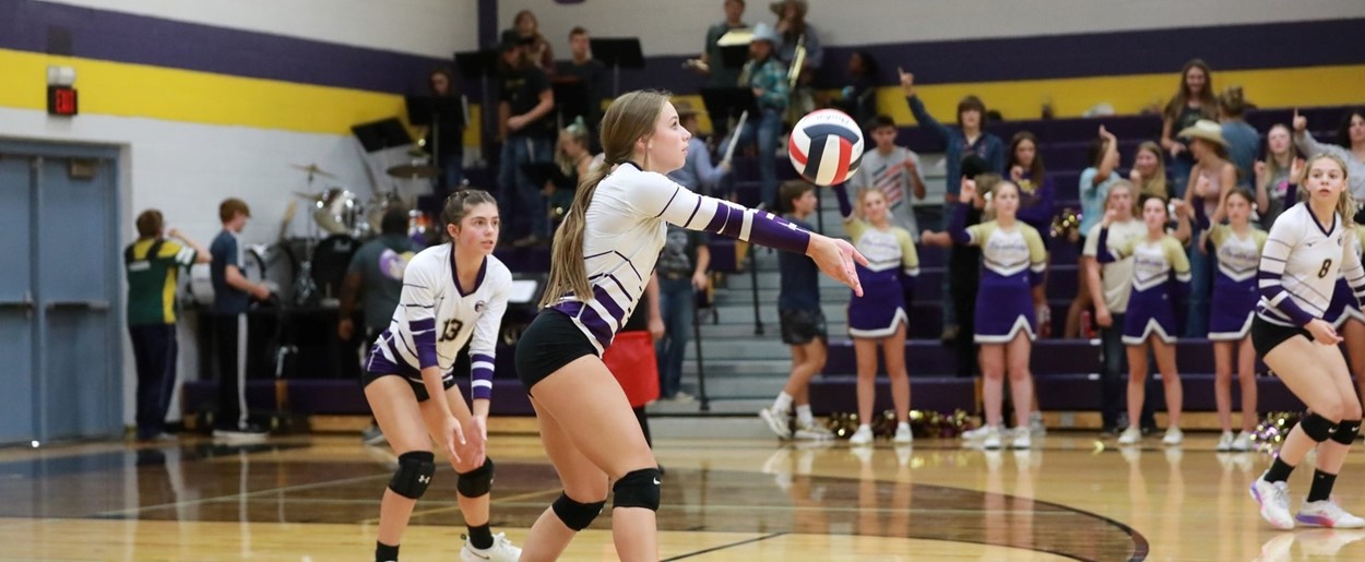 JHS girls volleyball player bumping ball
