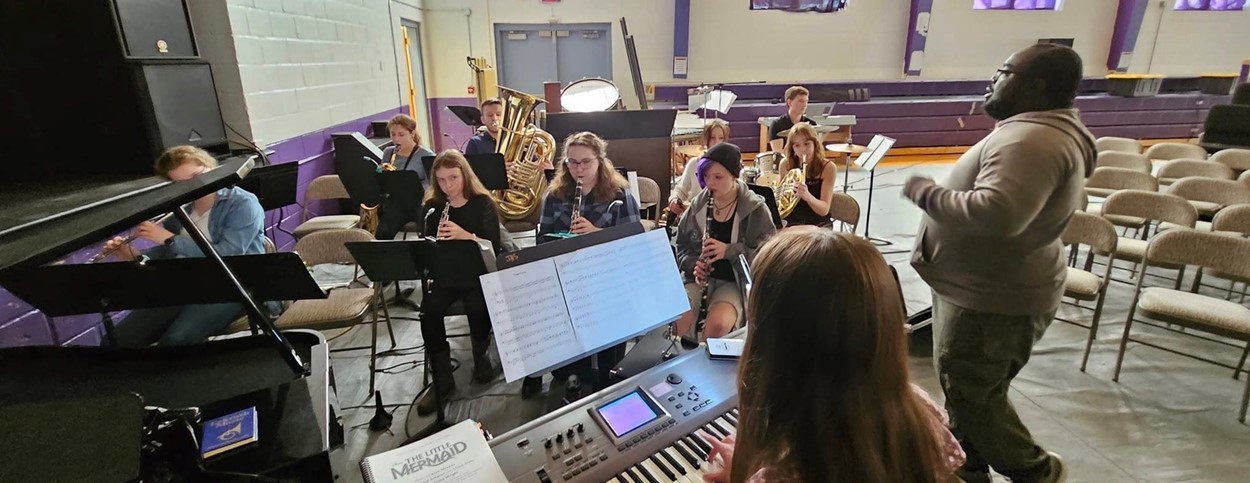 JHS band practicing for school musical